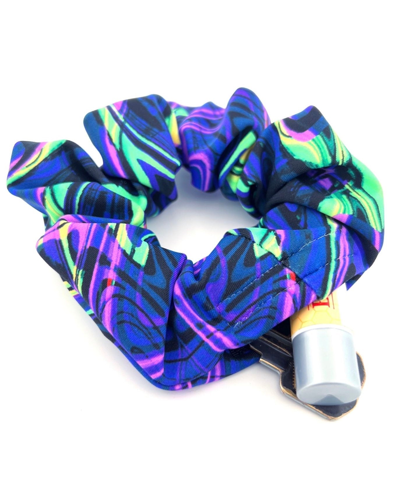 Acid Melt Stash Scrunchie with Velcro Hidden Pocket on a wrist showing off the hidden pocket - One Stop Rave.