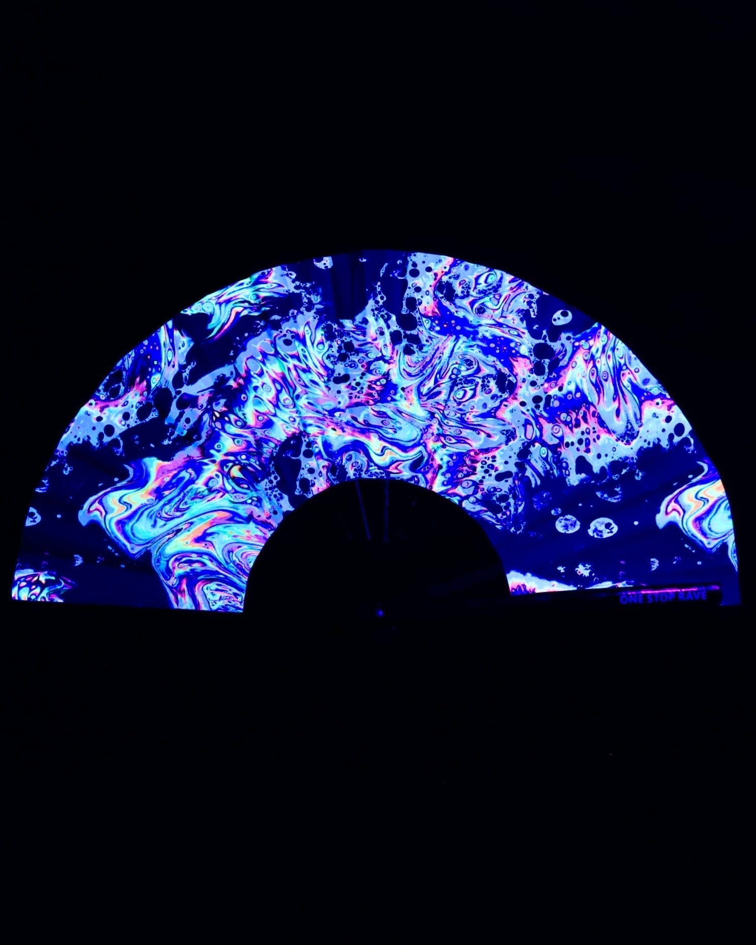 Acid Trip hand fan glowing under blacklight UV-Reactive