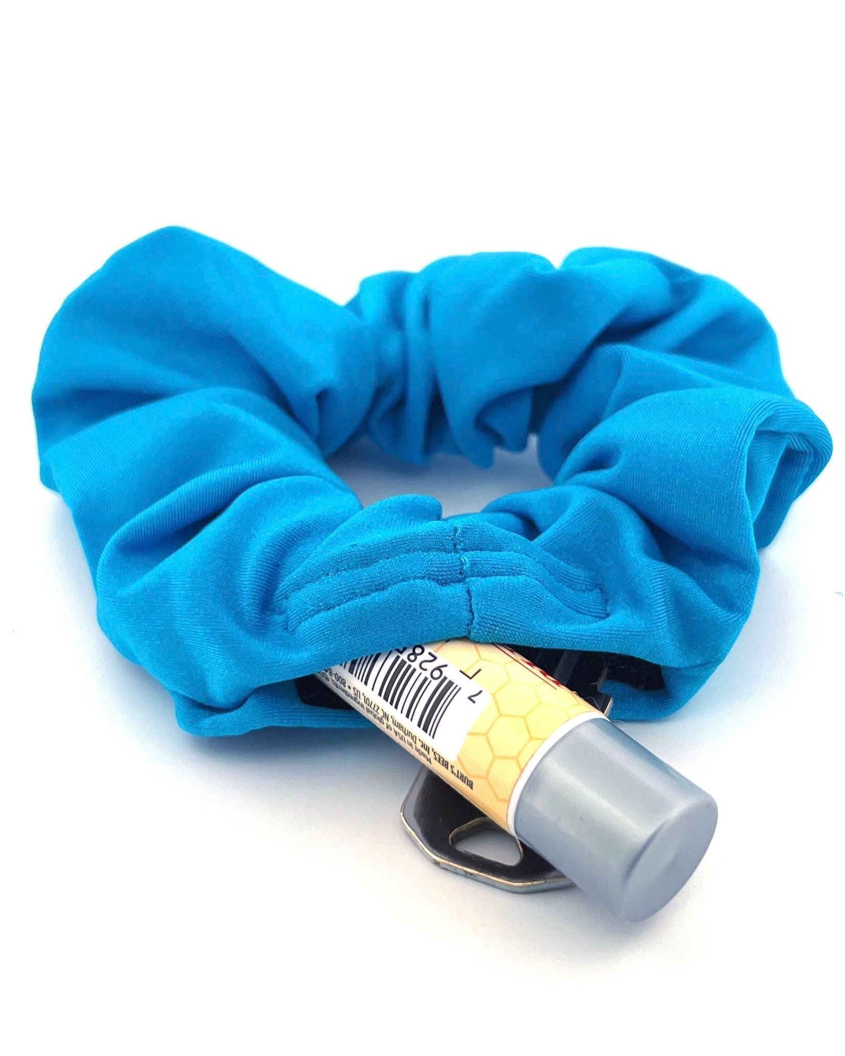 Blue Stashie with Hidden Pocket – A solid blue stash scrunchie featuring a hidden 2-inch Velcro® pocket, designed for secure and stylish storage on the go.