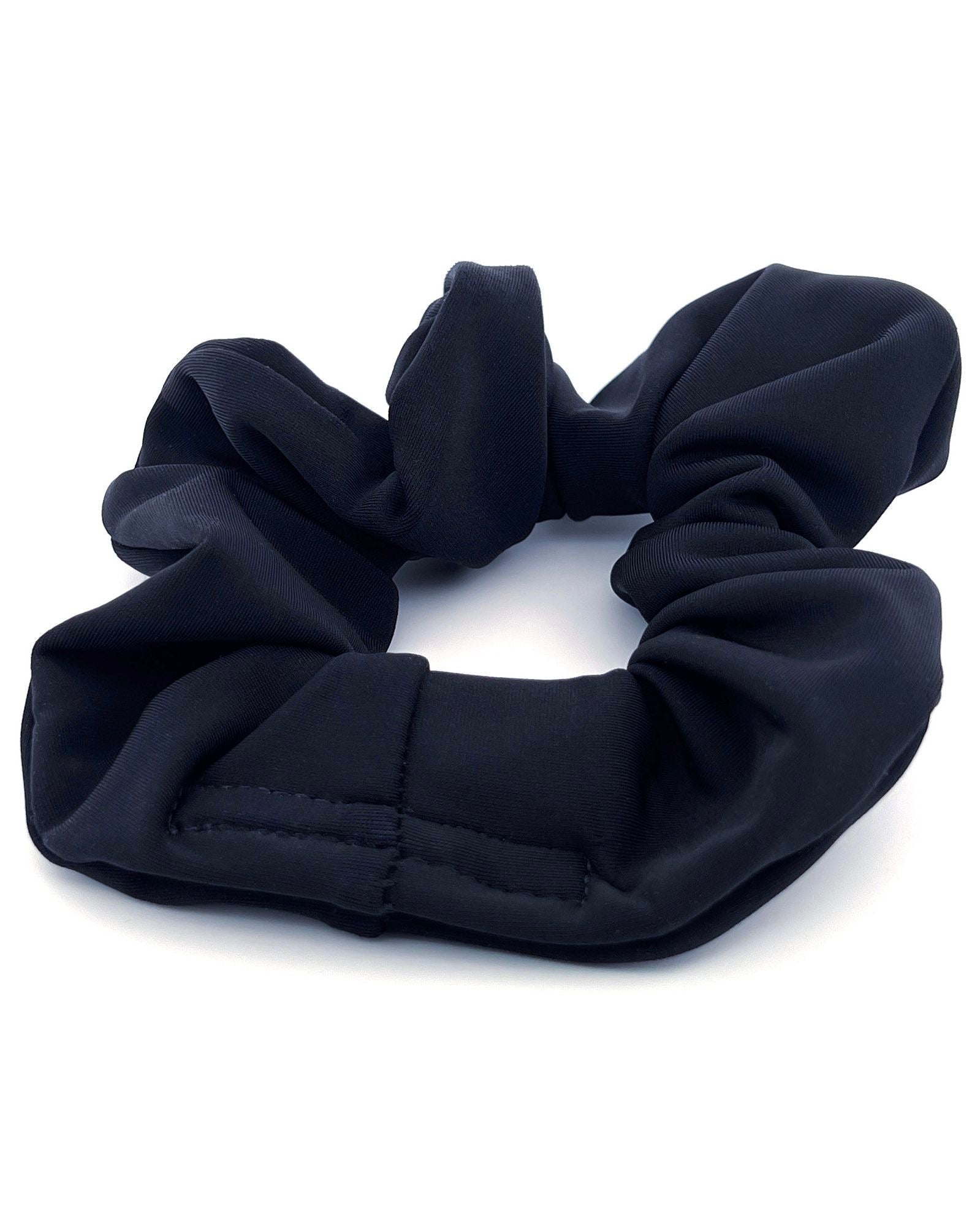 Black Scrunchie with a hidden pocket to store small items. One Stop Rave.