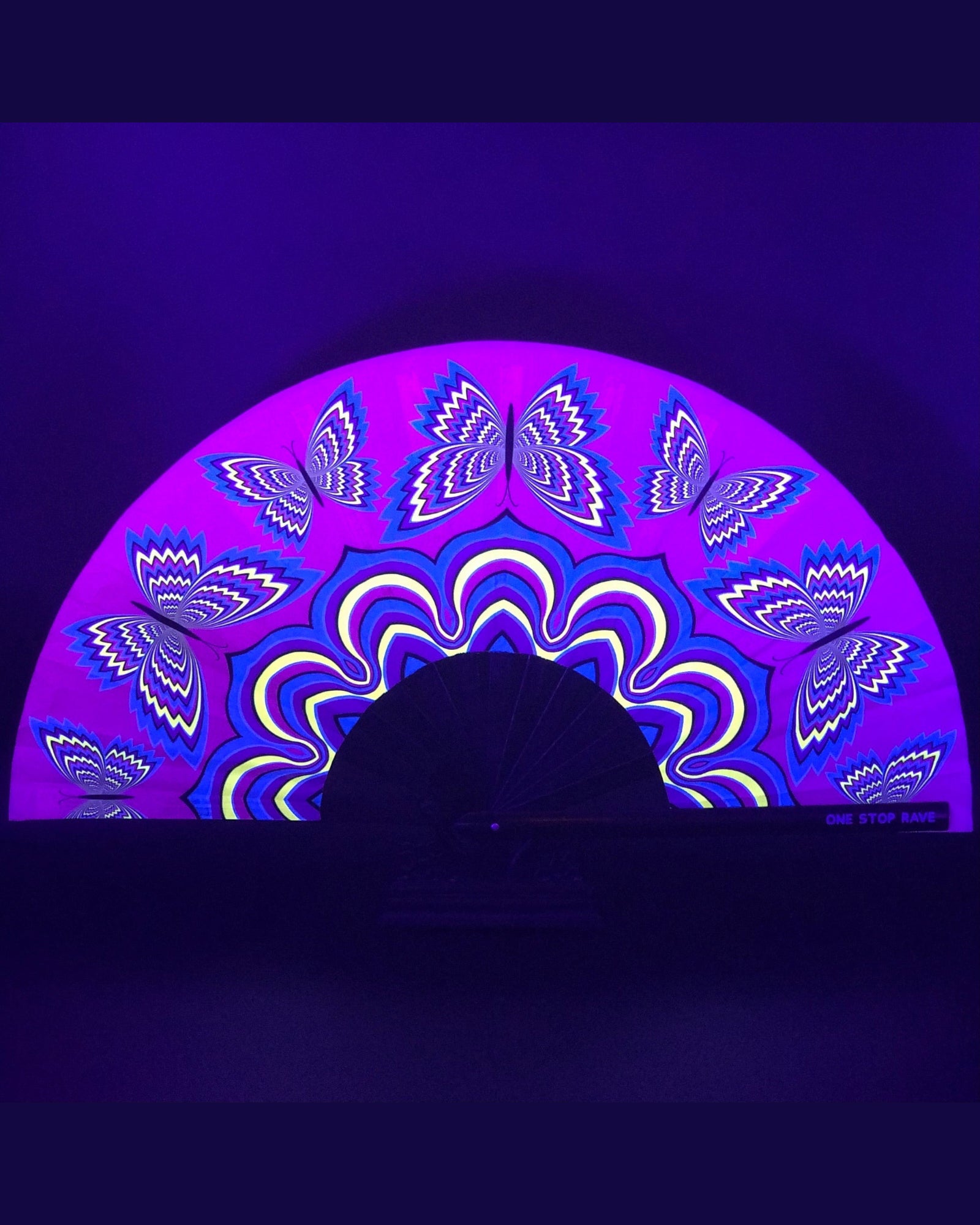 Butterfly Trip hand fan glowing purple blue under blacklight UV-Reactive