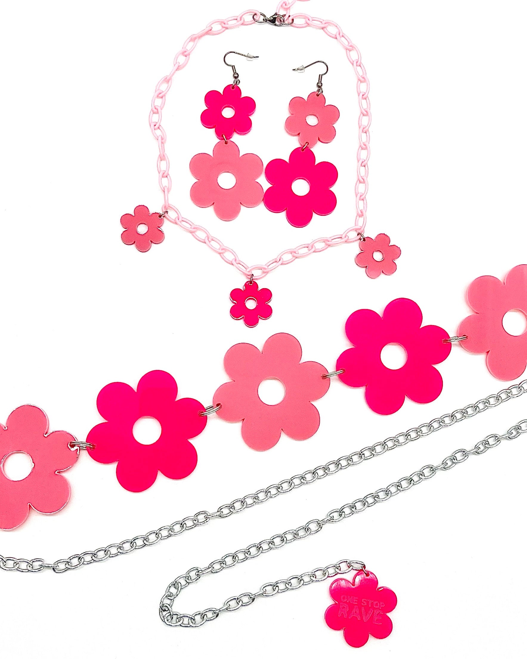 The matching Flower Power Pink set which includes the earrings, choker, and belt.