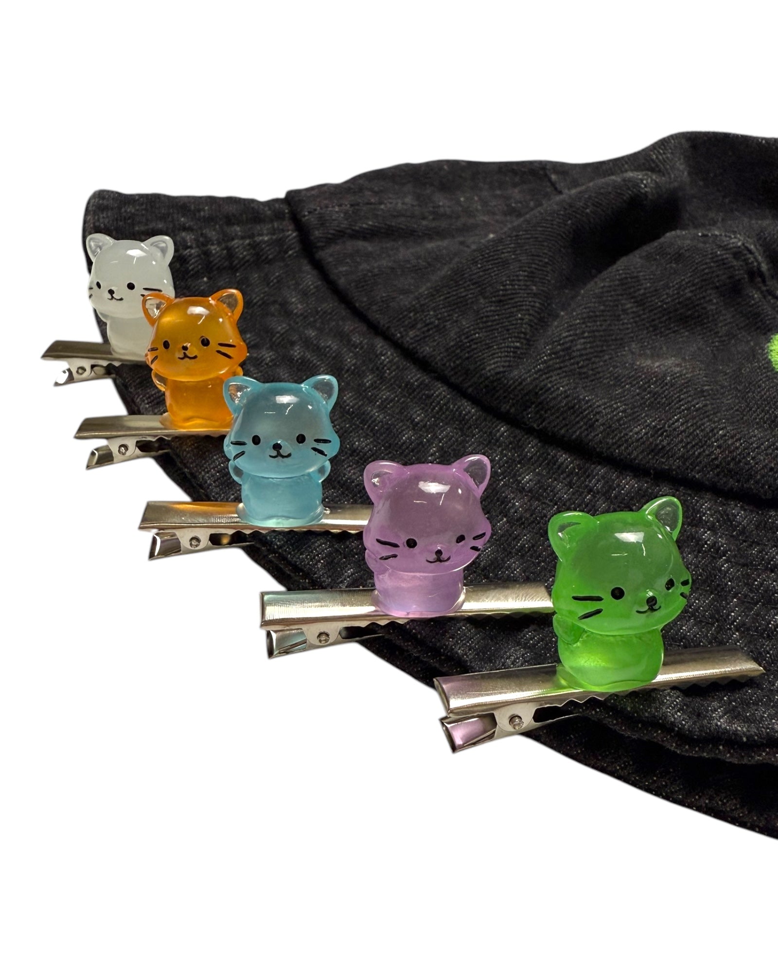 Juego de 5 pinzas para gatos que brillan en la oscuridad