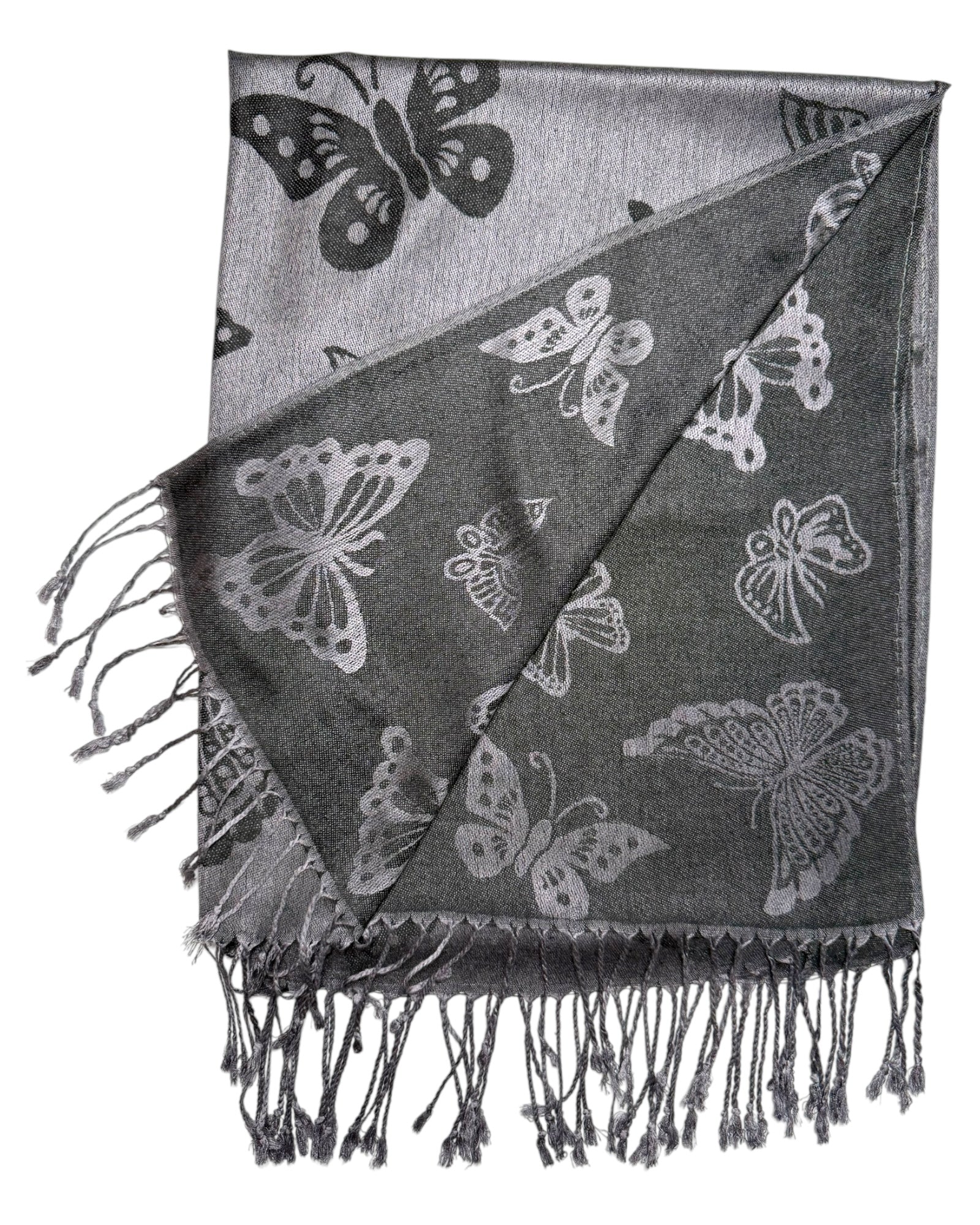 A grey reversible pashmina scarf with a butterfly pattern, fringed ends, and a lightweight fabric.
