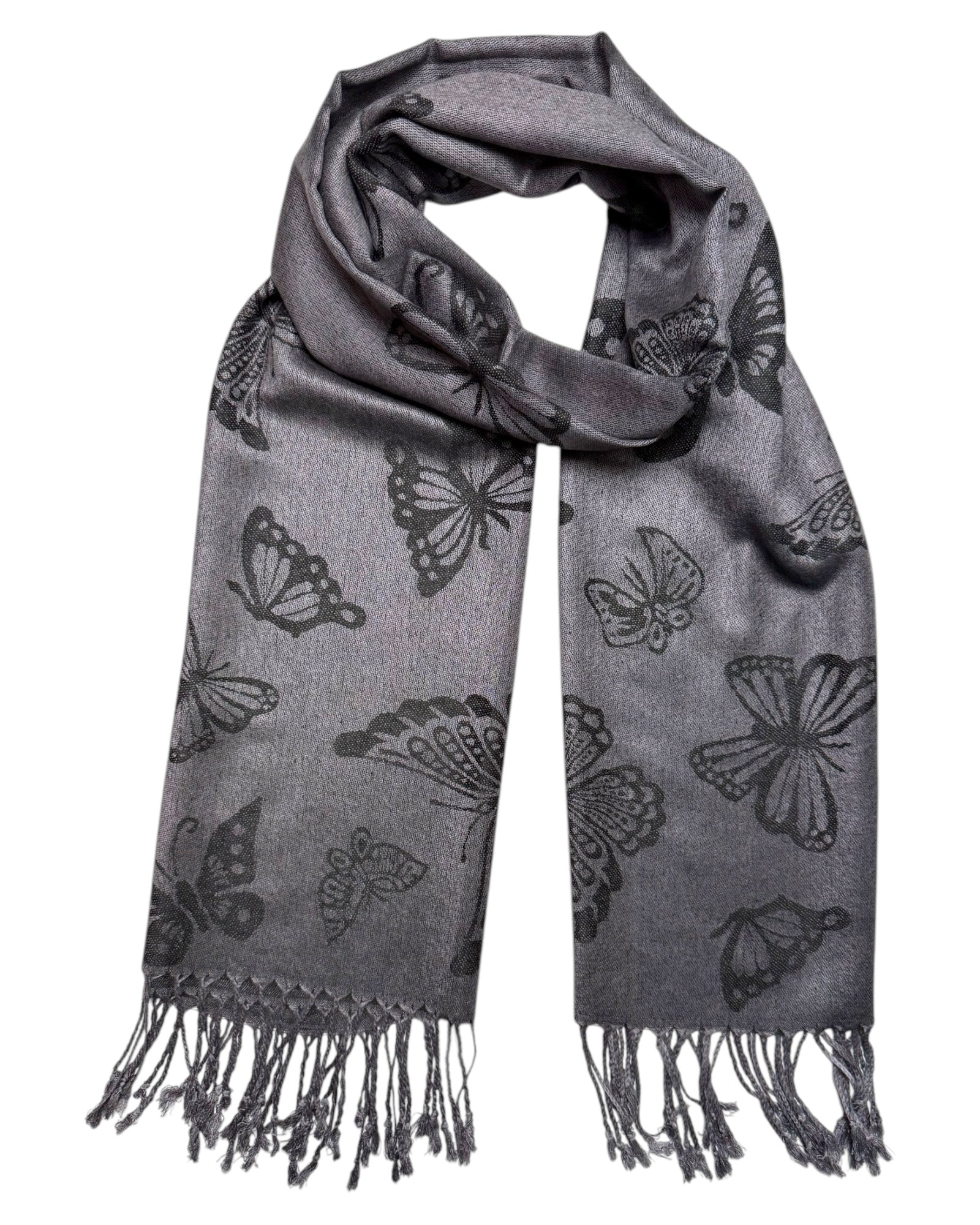 A grey reversible pashmina scarf with a butterfly pattern, fringed ends, and a lightweight fabric.