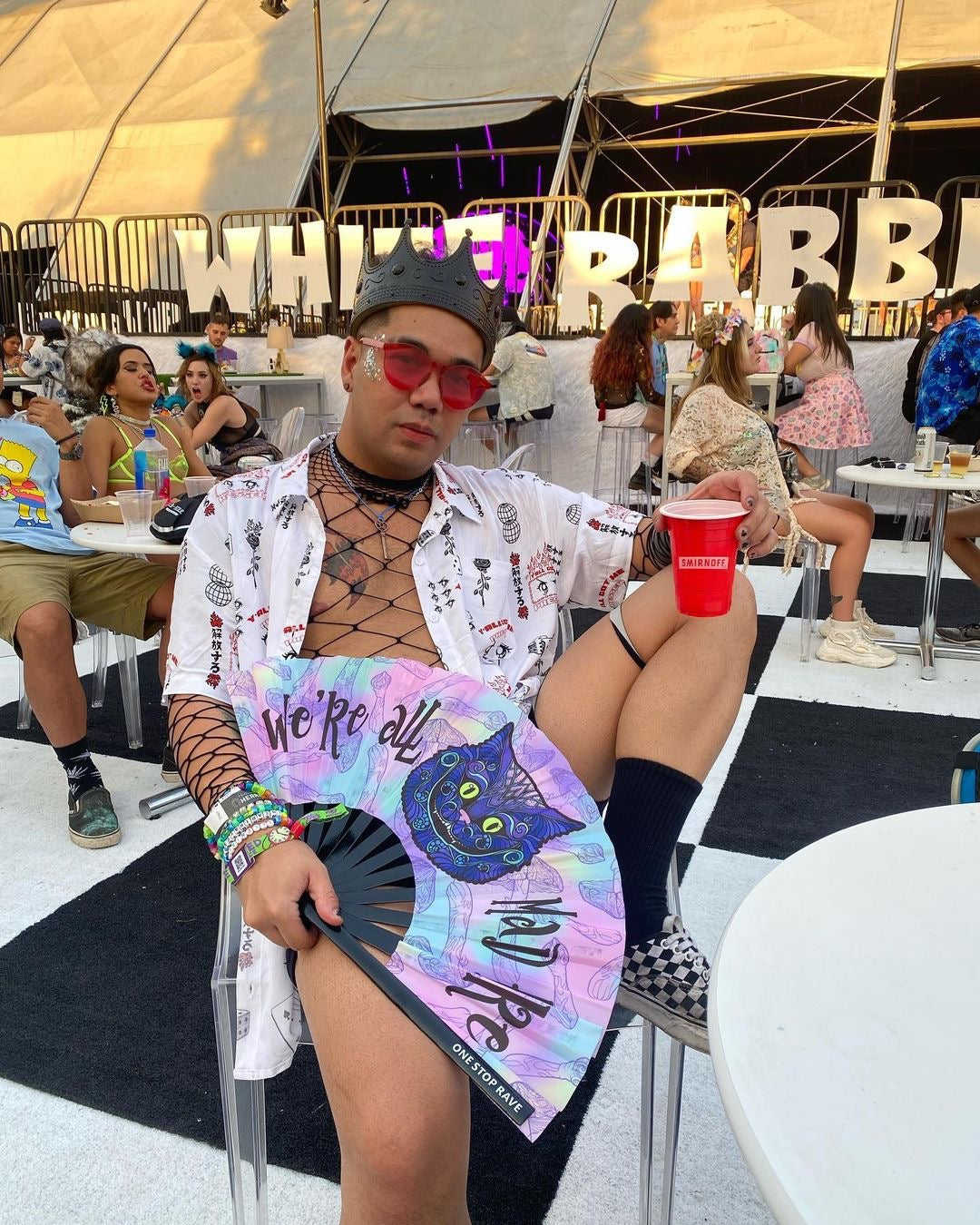 Mad Catter hand fan with customer worn at beyond wonderland festival