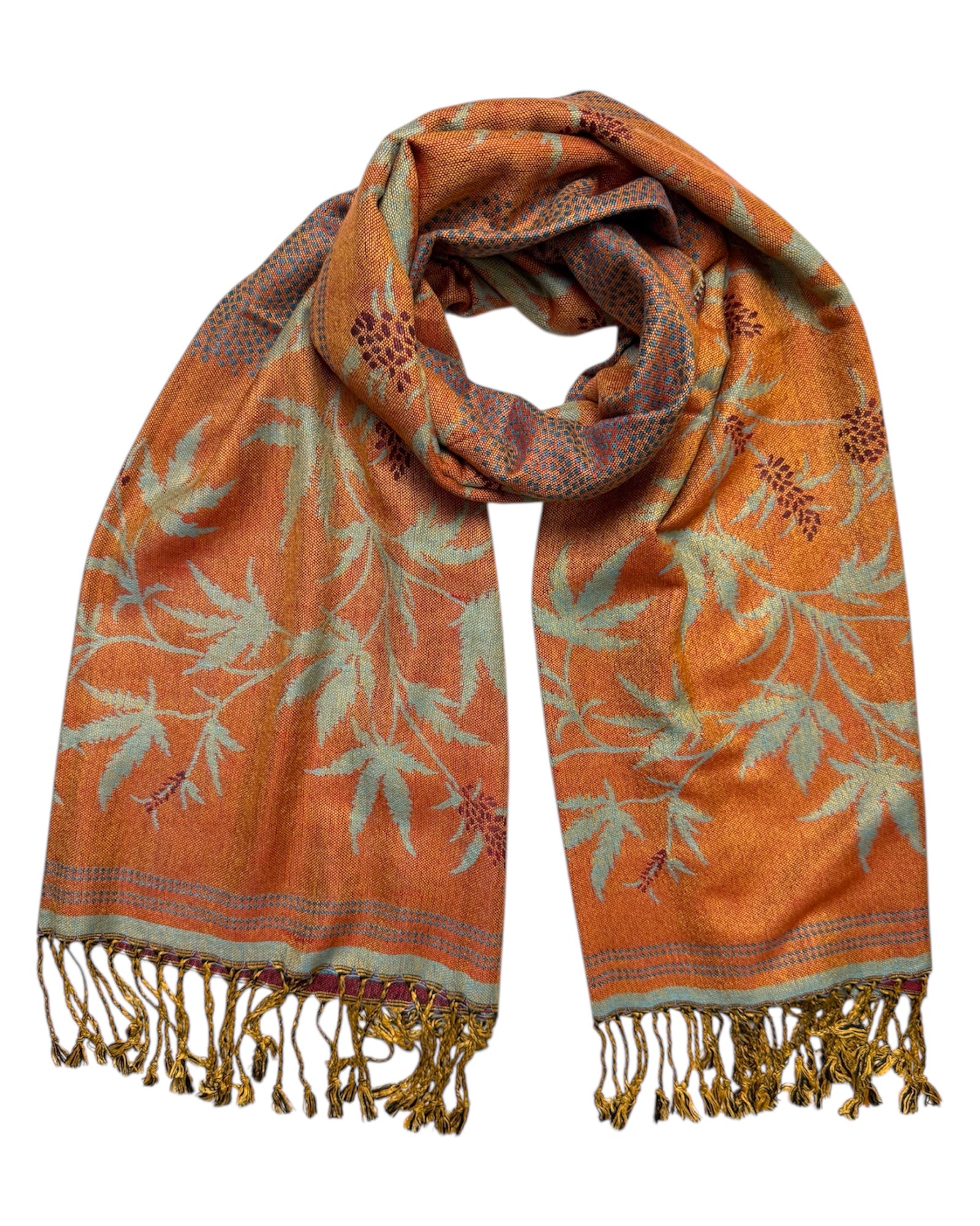 Orange scarf with leaf pattern and fringes on a white background