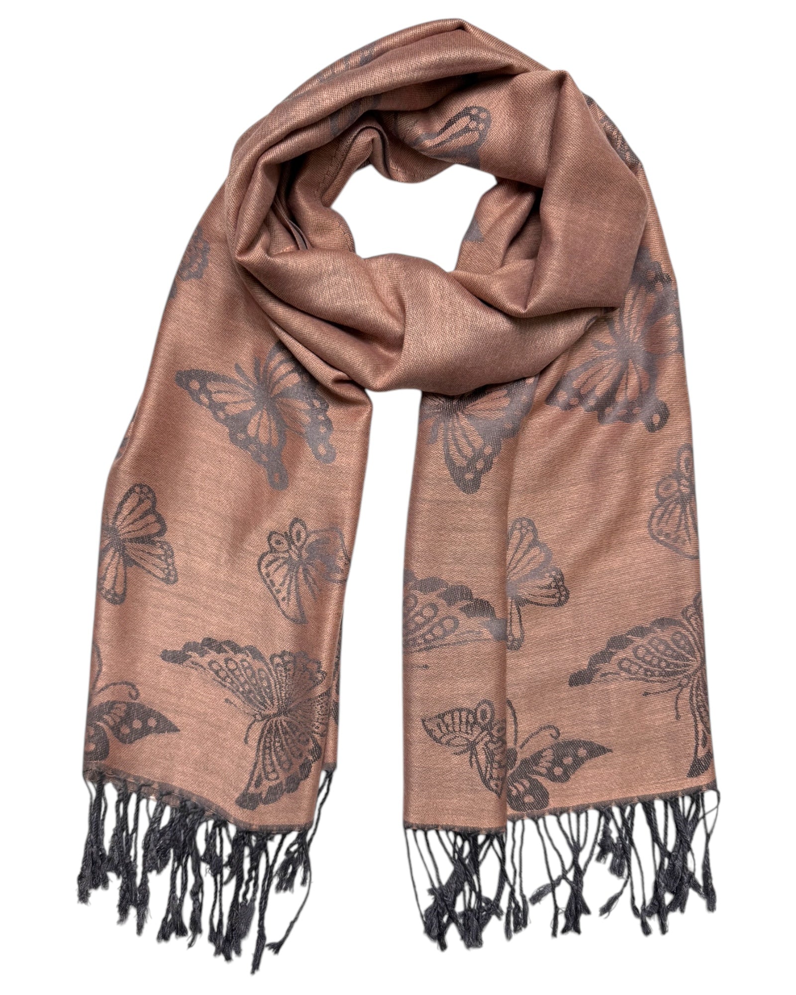 A scarf with a reversible design featuring butterfly patterns on a rose gold and grey background with fringe trim.