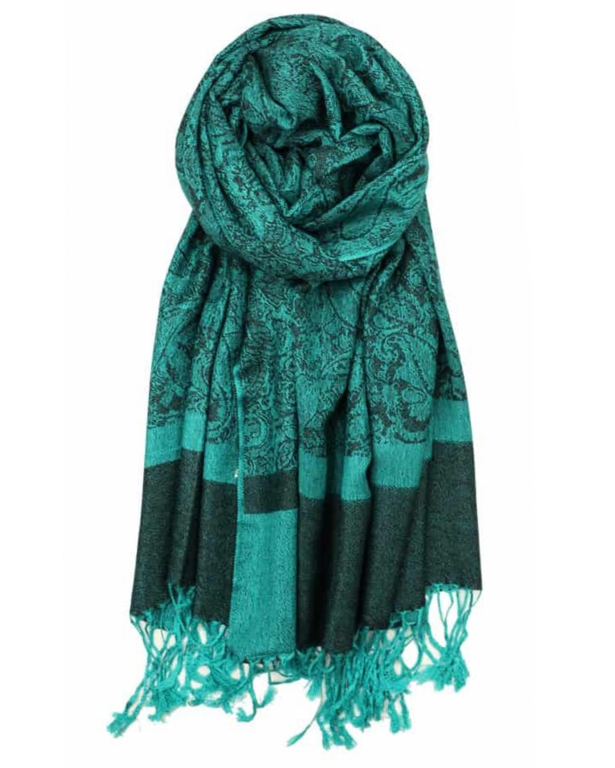 A seafoam green pashmina with paisley patterns and fringes displayed on a white background.