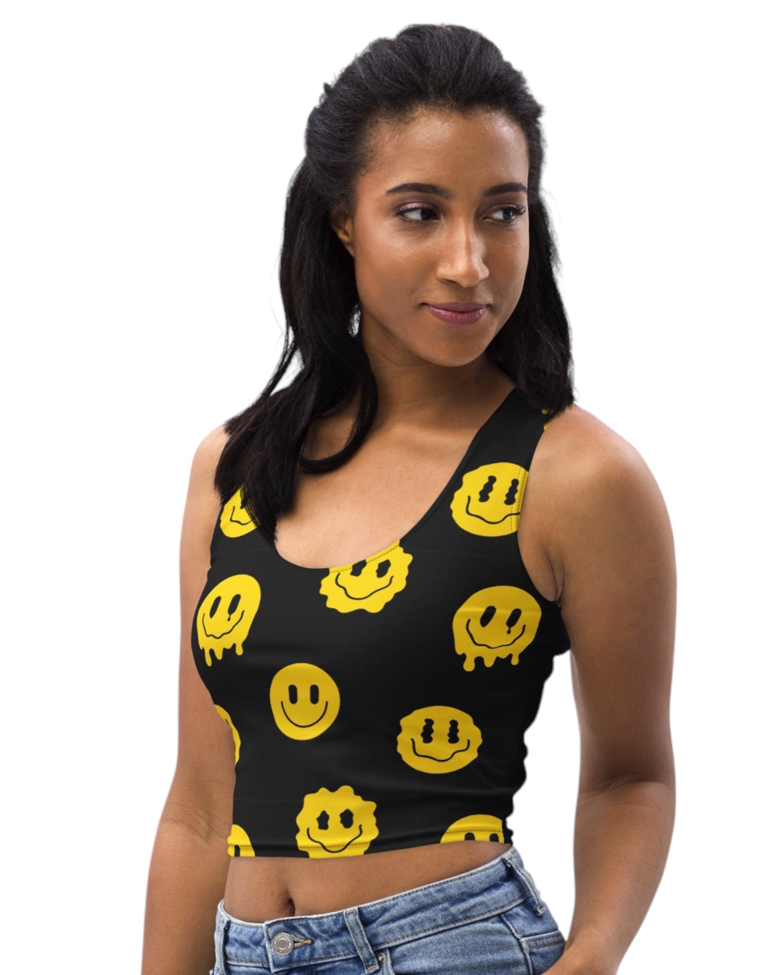 Side view of Trippie Crop Top model - Featuring yellow smiley faces on a black crop top, ideal for festival fashion and rave outfits.