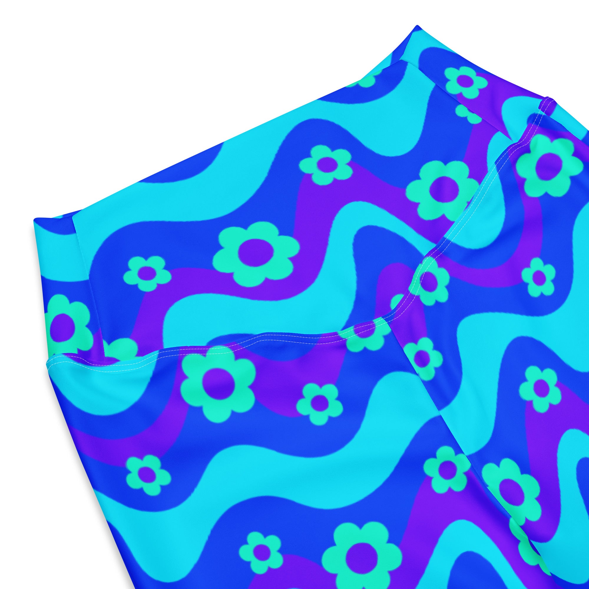 Pantalones acampanados azules con estampado floral