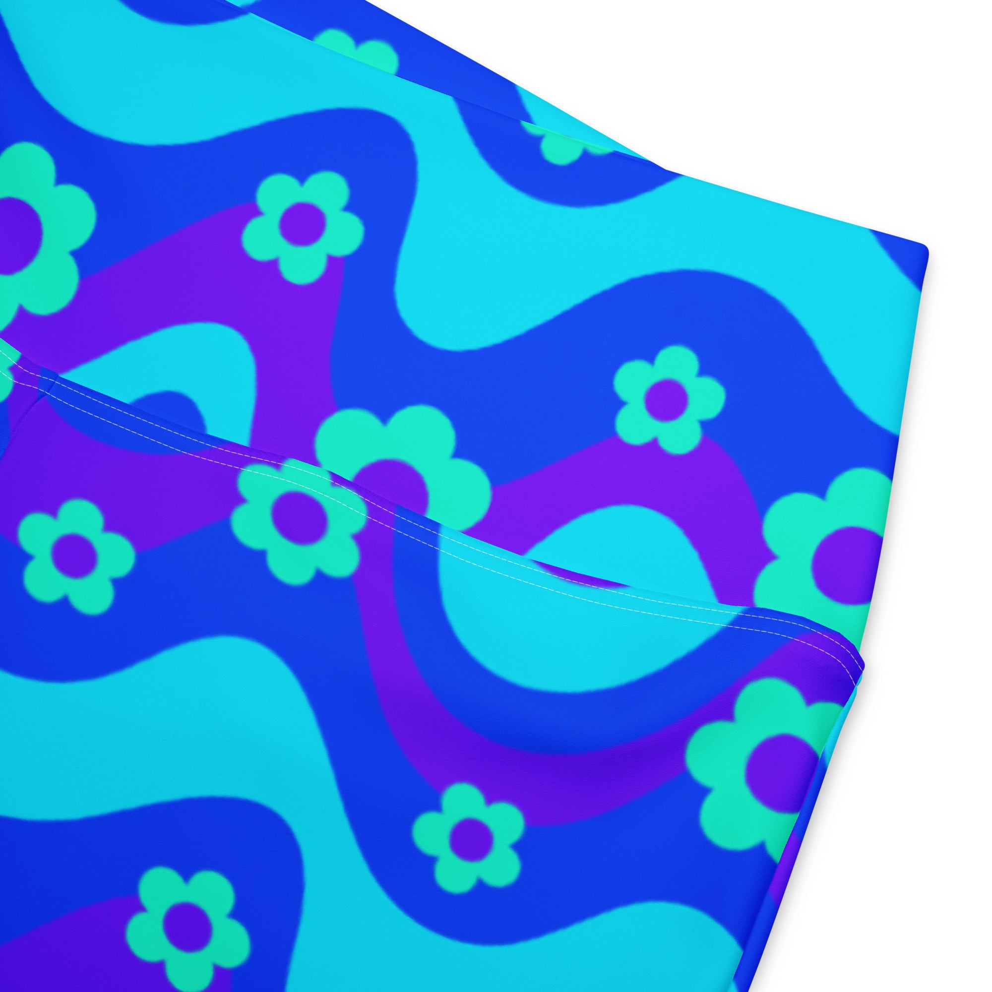 Pantalones acampanados azules con estampado floral