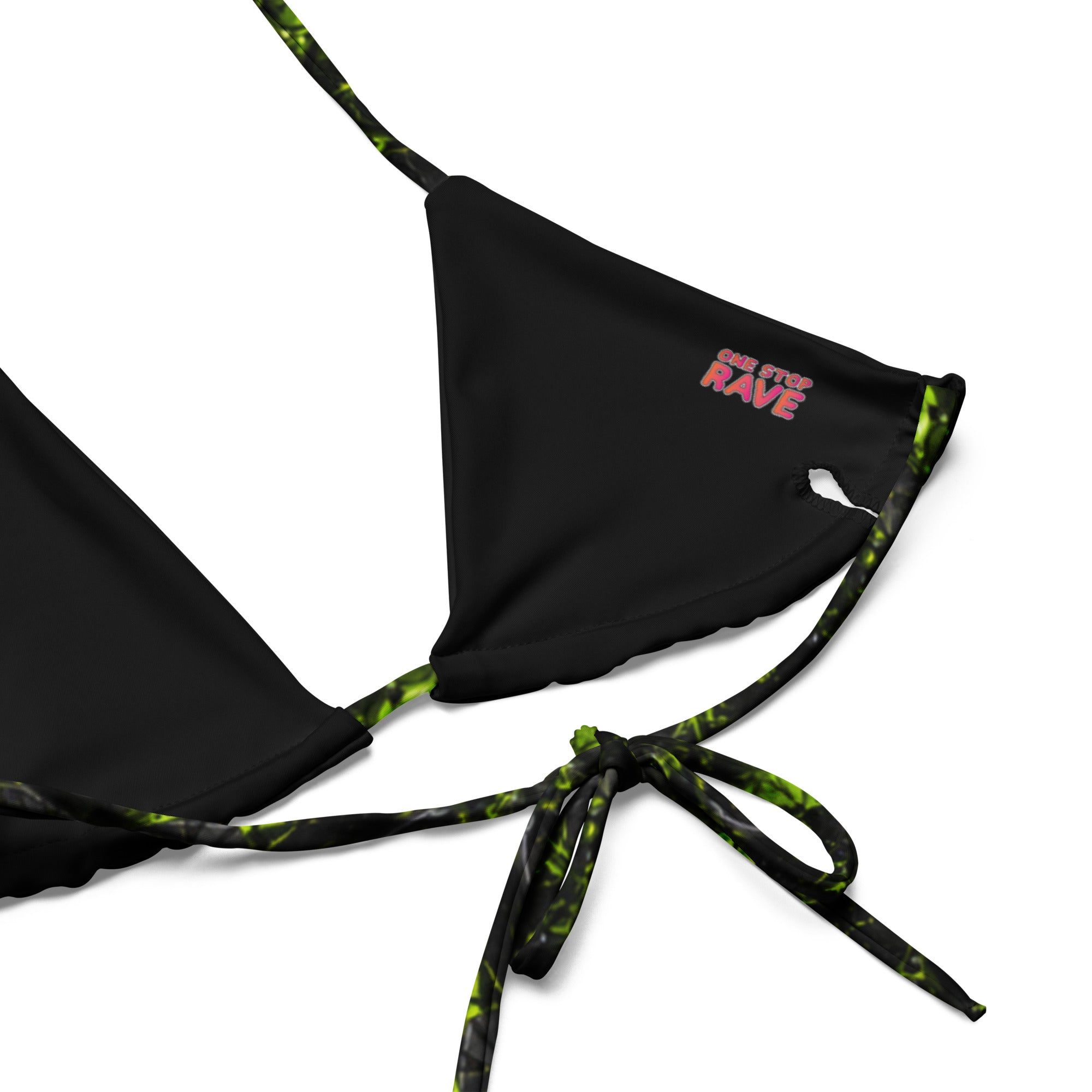 Close-up of black bikini top with green and black cracked-texture ties and logo detail, showing tie closure.