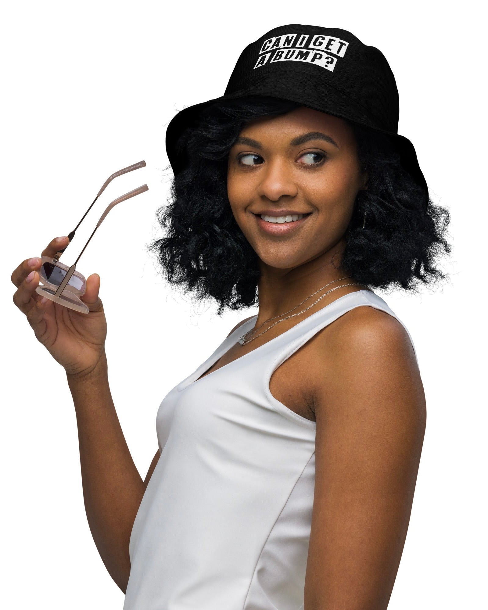 Model wearing a black bucket hat with the phrase "CAN I GET A BUMP?".