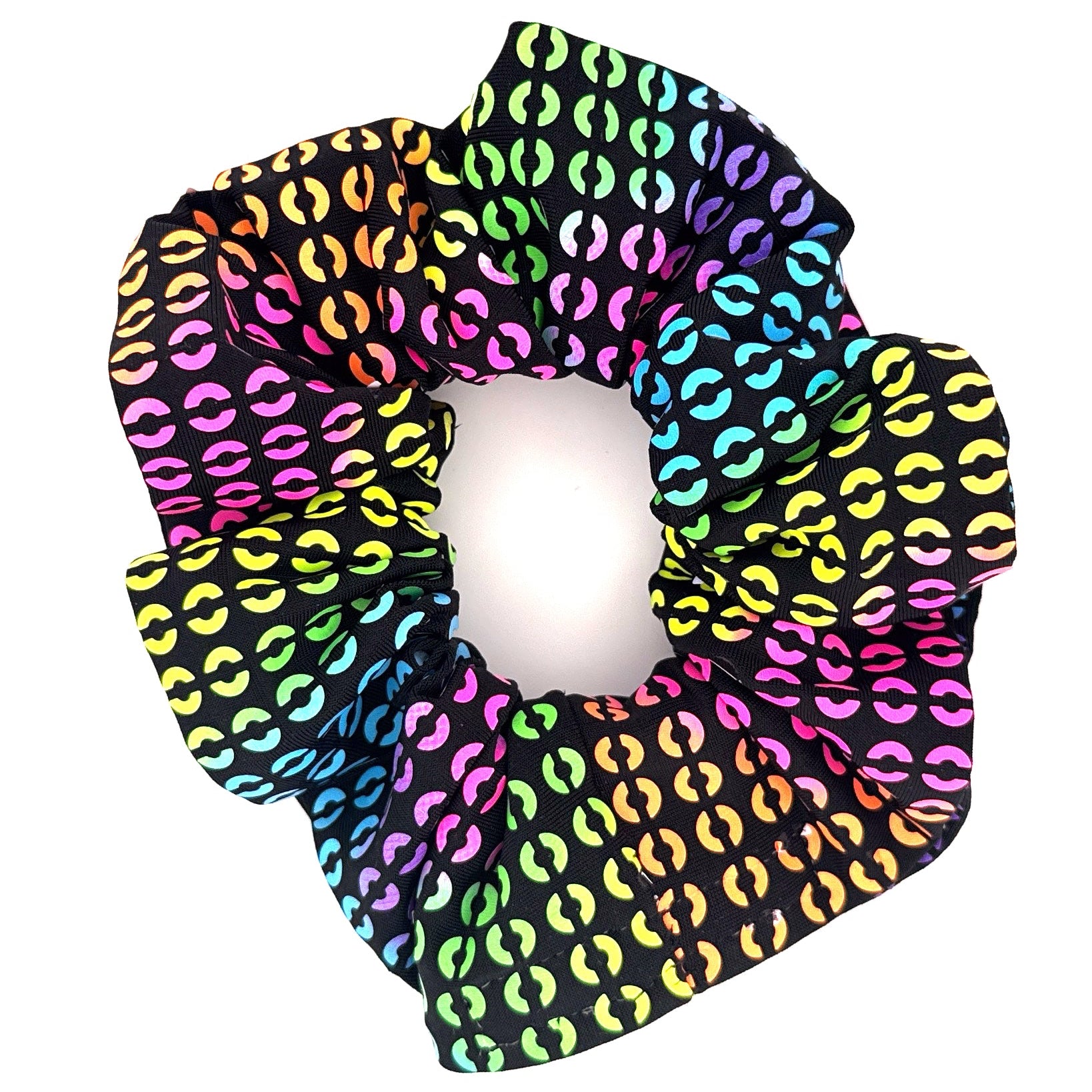 Neon Link stashie with rainbow chain pattern on black fabric, worn as a rave outfit hair or wrist accessory