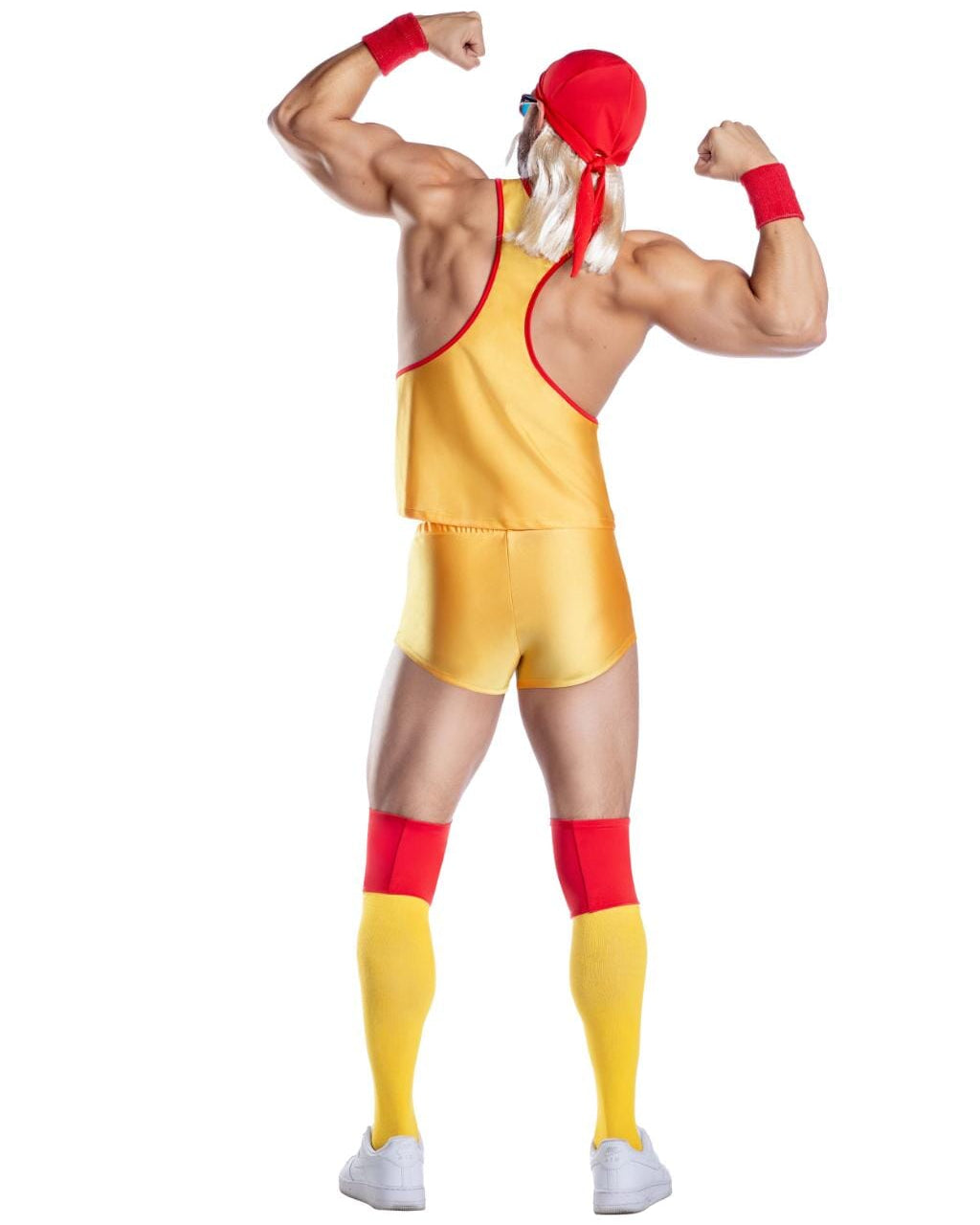 A person modeling a yellow and red wrestling costume from the back, featuring a yellow singlet, matching shorts, red headband, red wristbands, and red knee bands, against a plain white background.