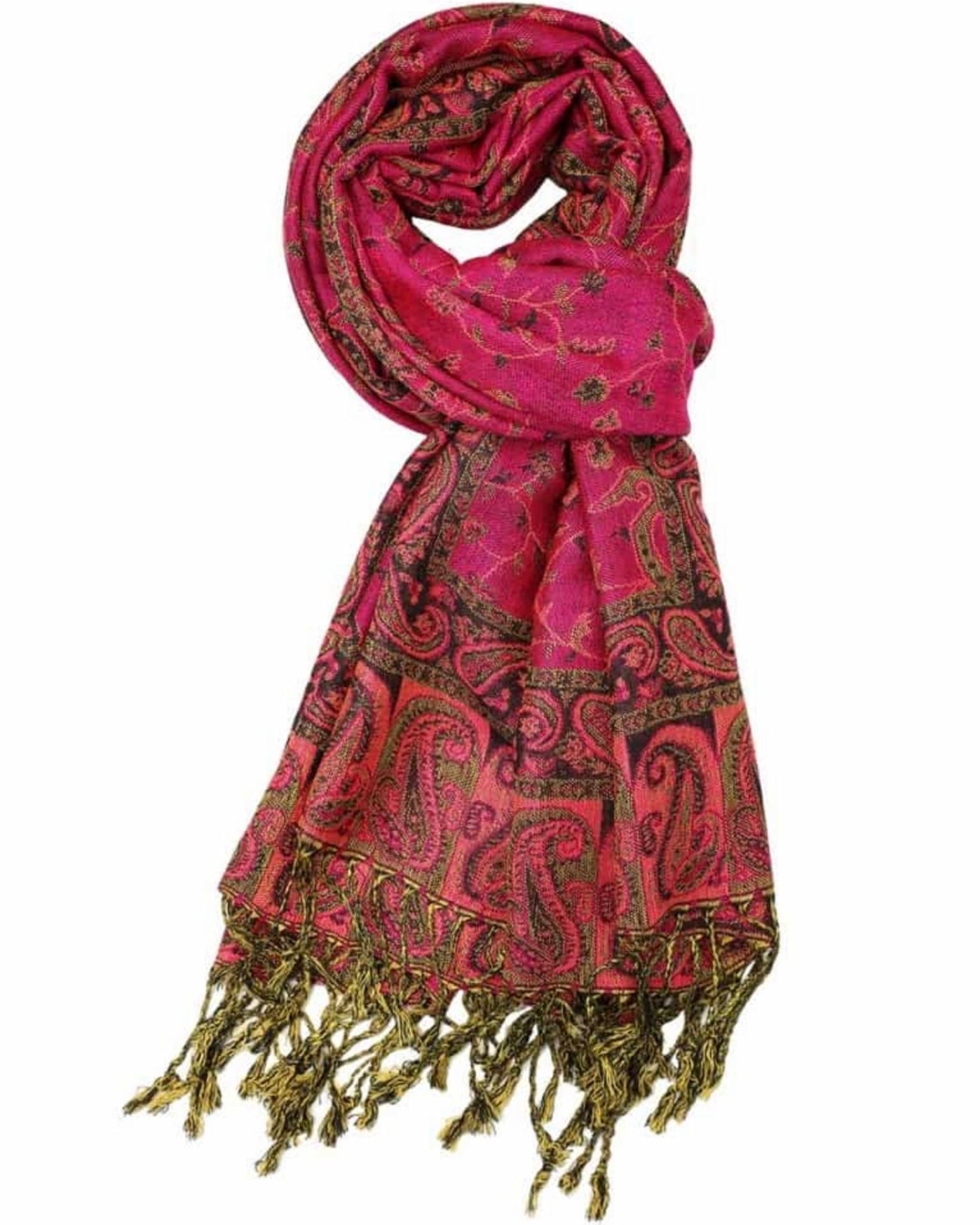 A pink and green paisley pattern pashmina with fringes draped around, showcasing the pattern and color.