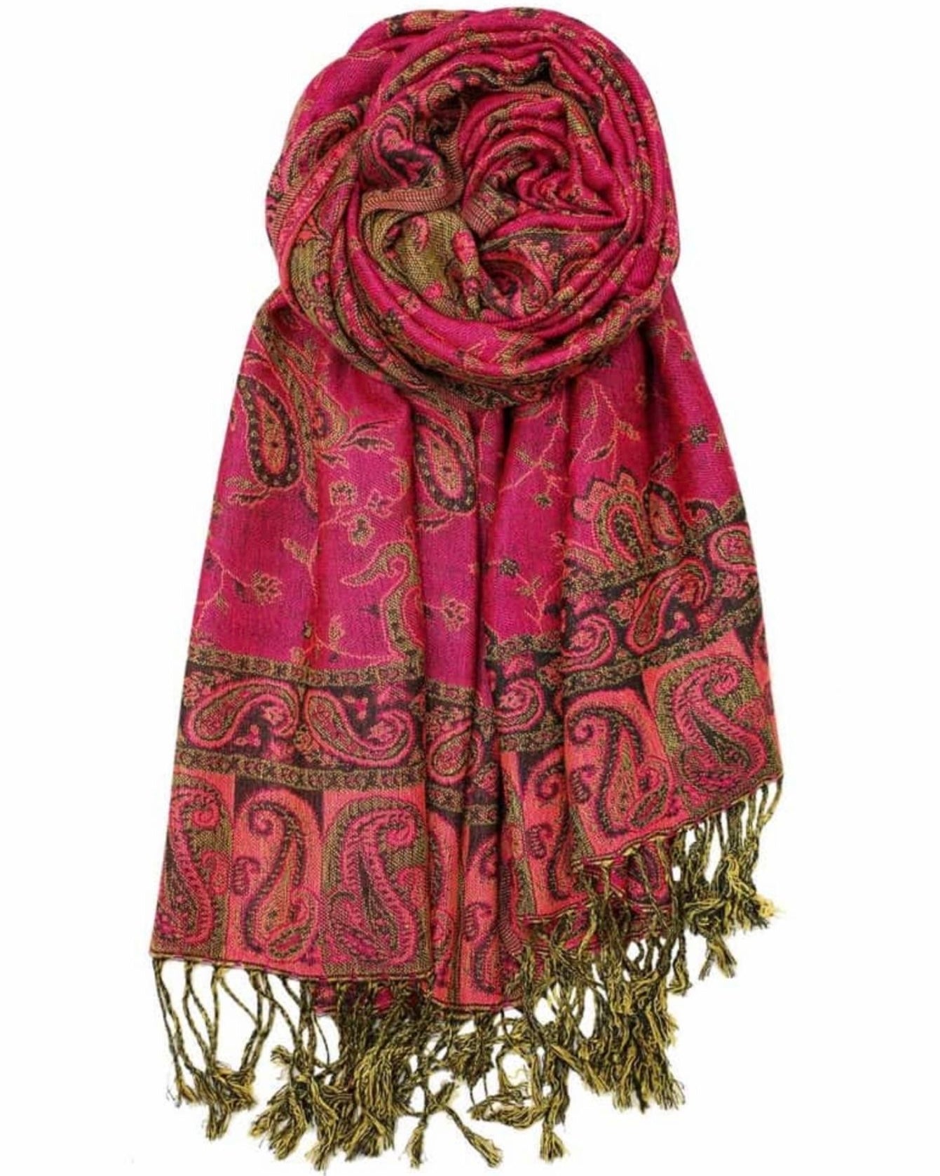 A pink and green paisley pattern pashmina with fringes draped around, showcasing the pattern and color.