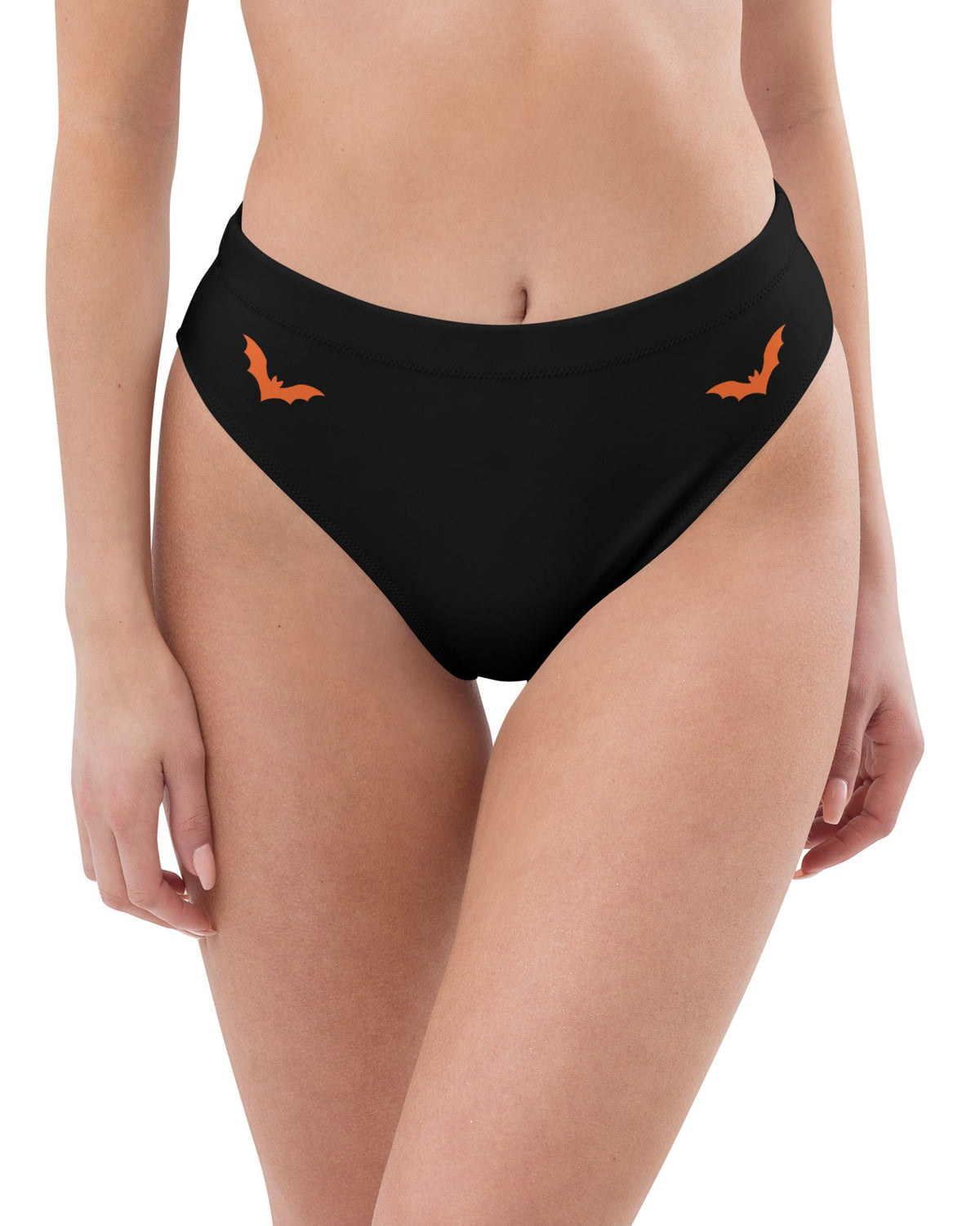 Recycled high-waisted rave bottoms featuring orange bat graphics