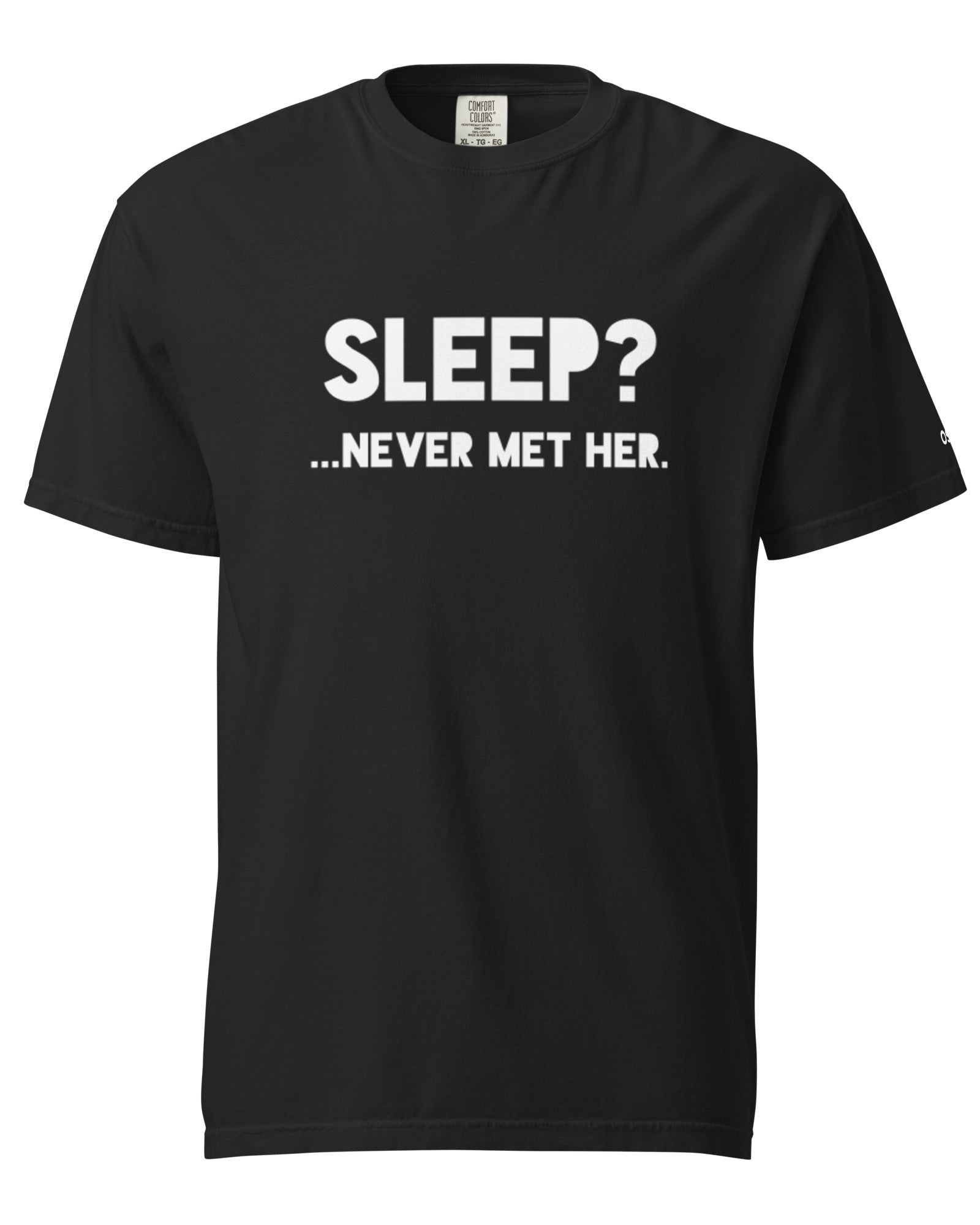 Black cotton t-shirt with bold white text that reads “SLEEP? …NEVER MET HER.” displayed flat on a white background.