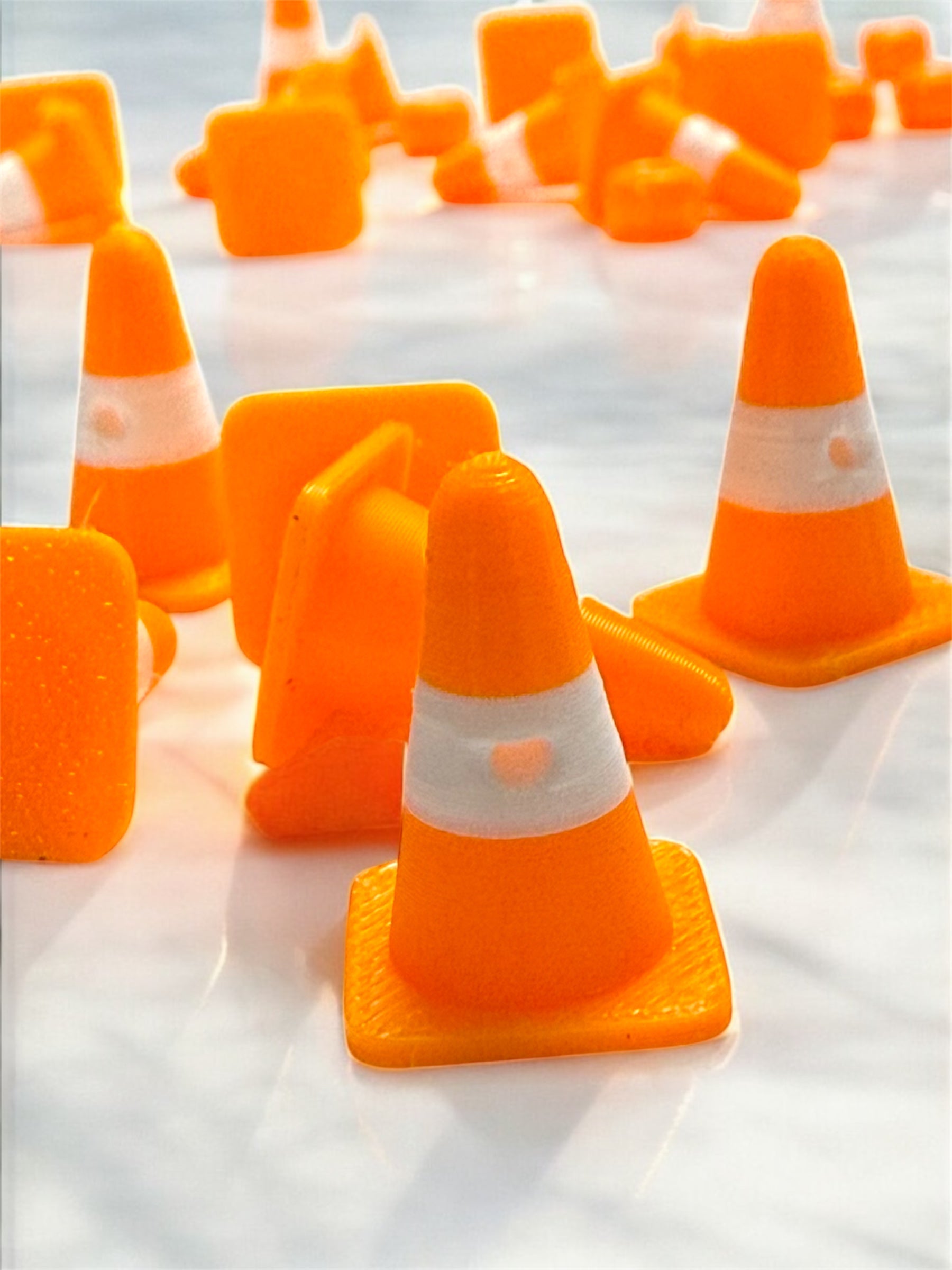 Close up of orange and white traffic cone kandi beads