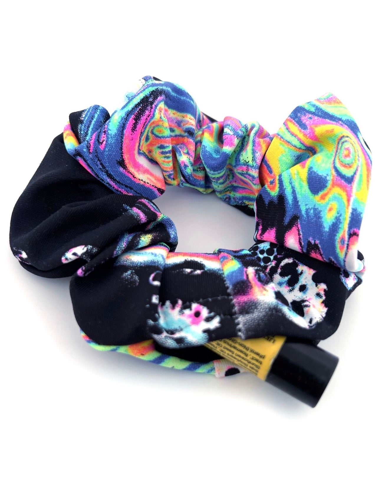 Acid Trip Scrunchie with stash pocket opened with chap stick and essentials.