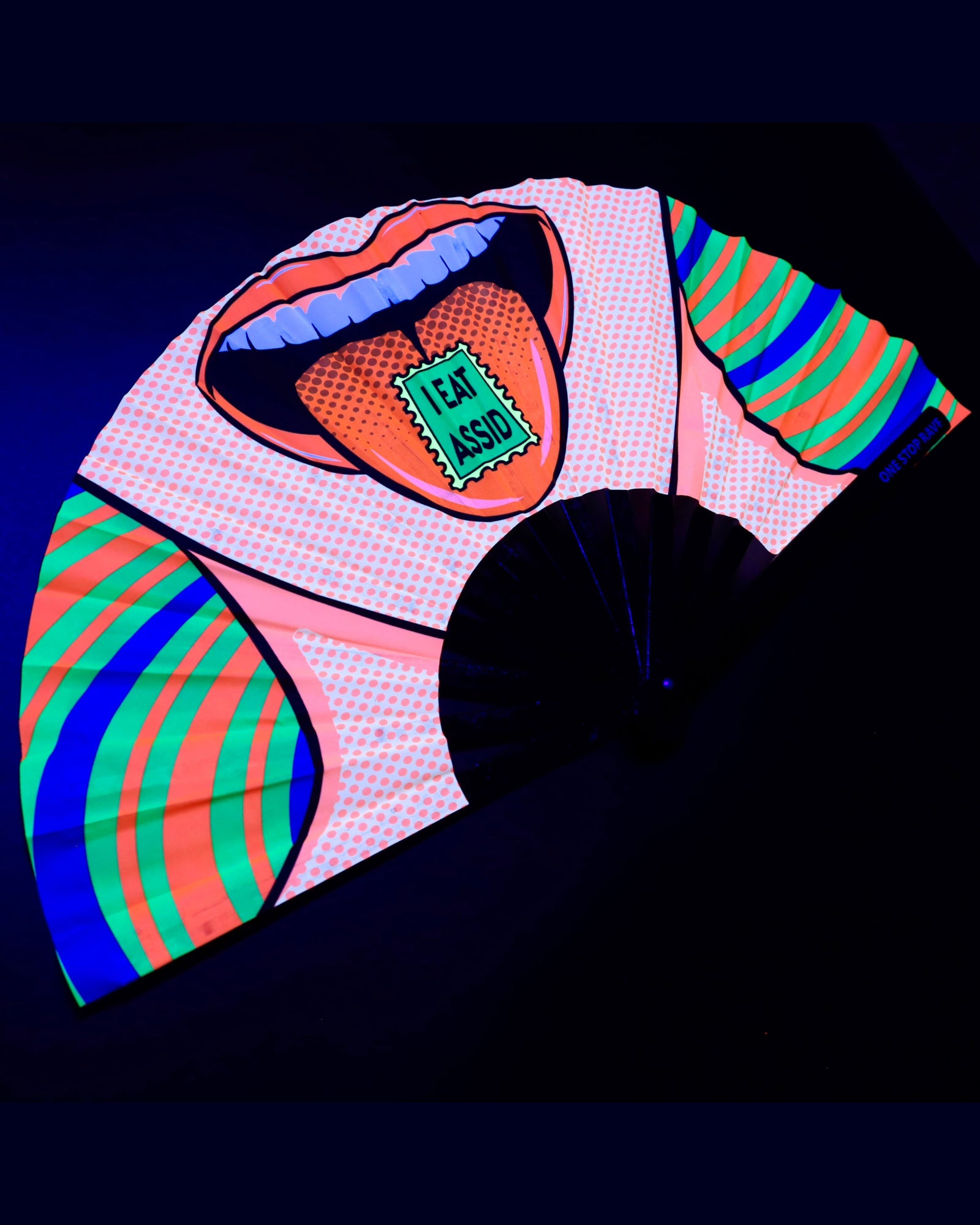 Angled shot of I Eat Assid Hand Fan under UV-light.