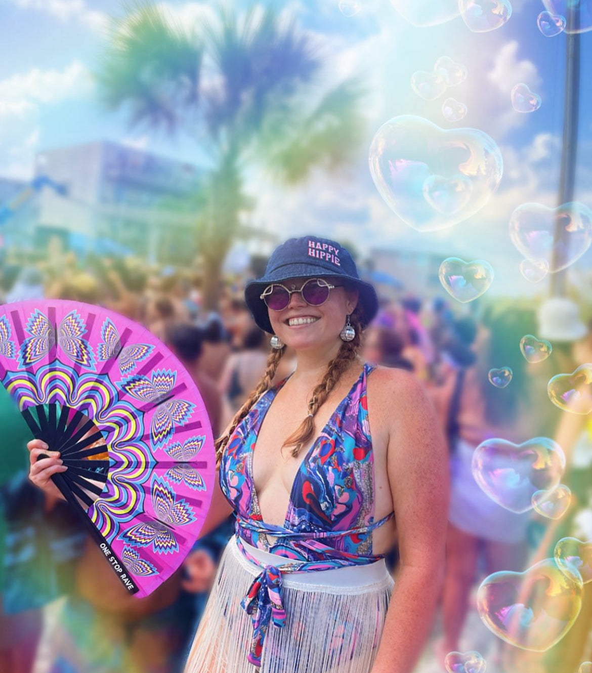 Butterfly Trip hand fan held at festival lifestyle photo