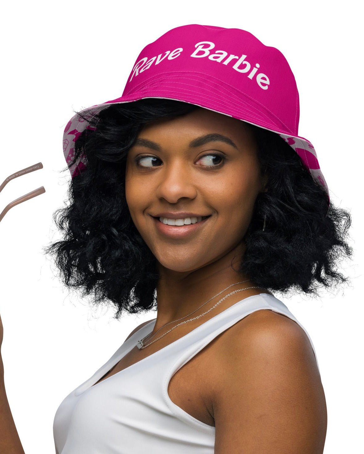 Model wearing the Rave Barbie Reversible Bucket Hat 