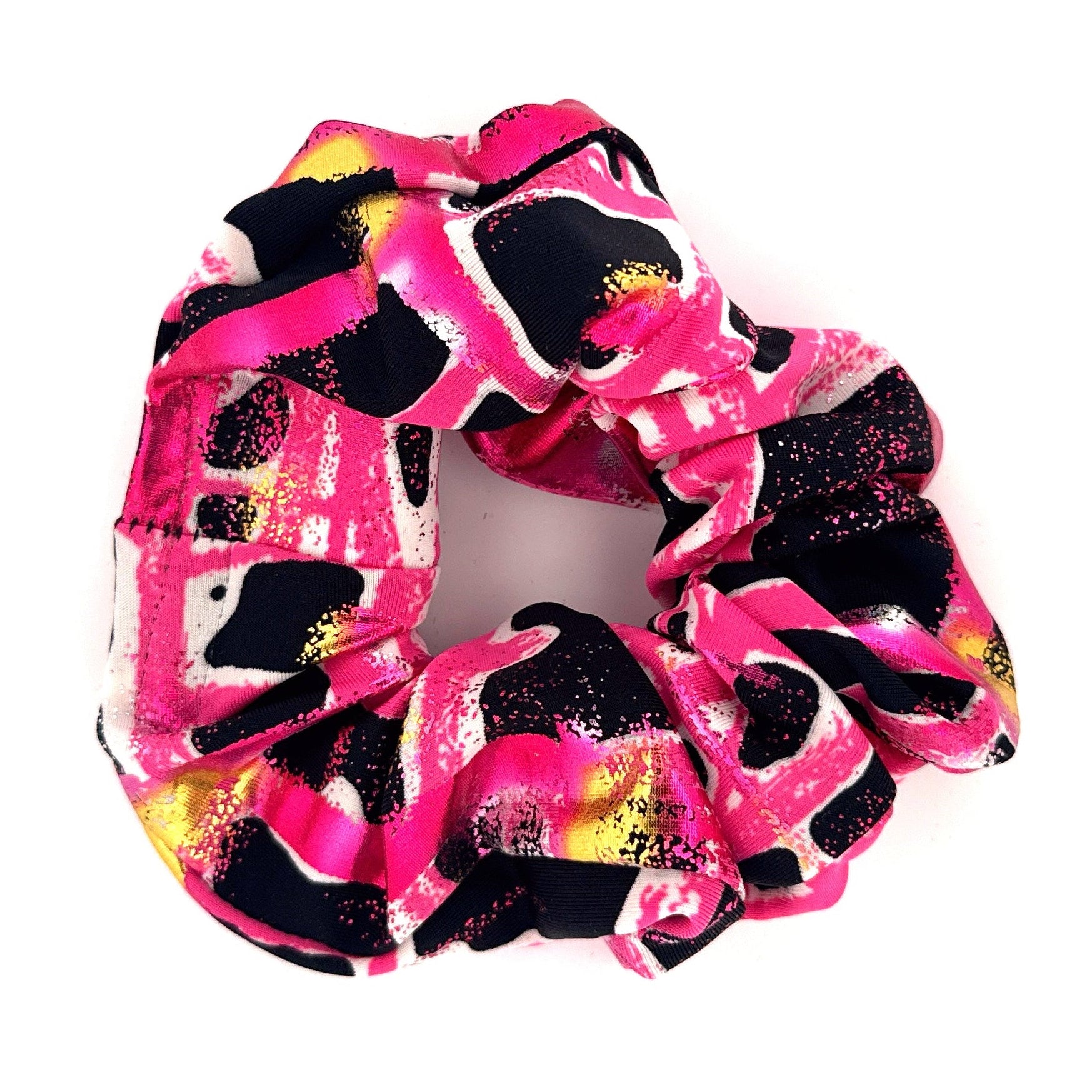 Colorful scrunchie with black and pink pattern on a white background