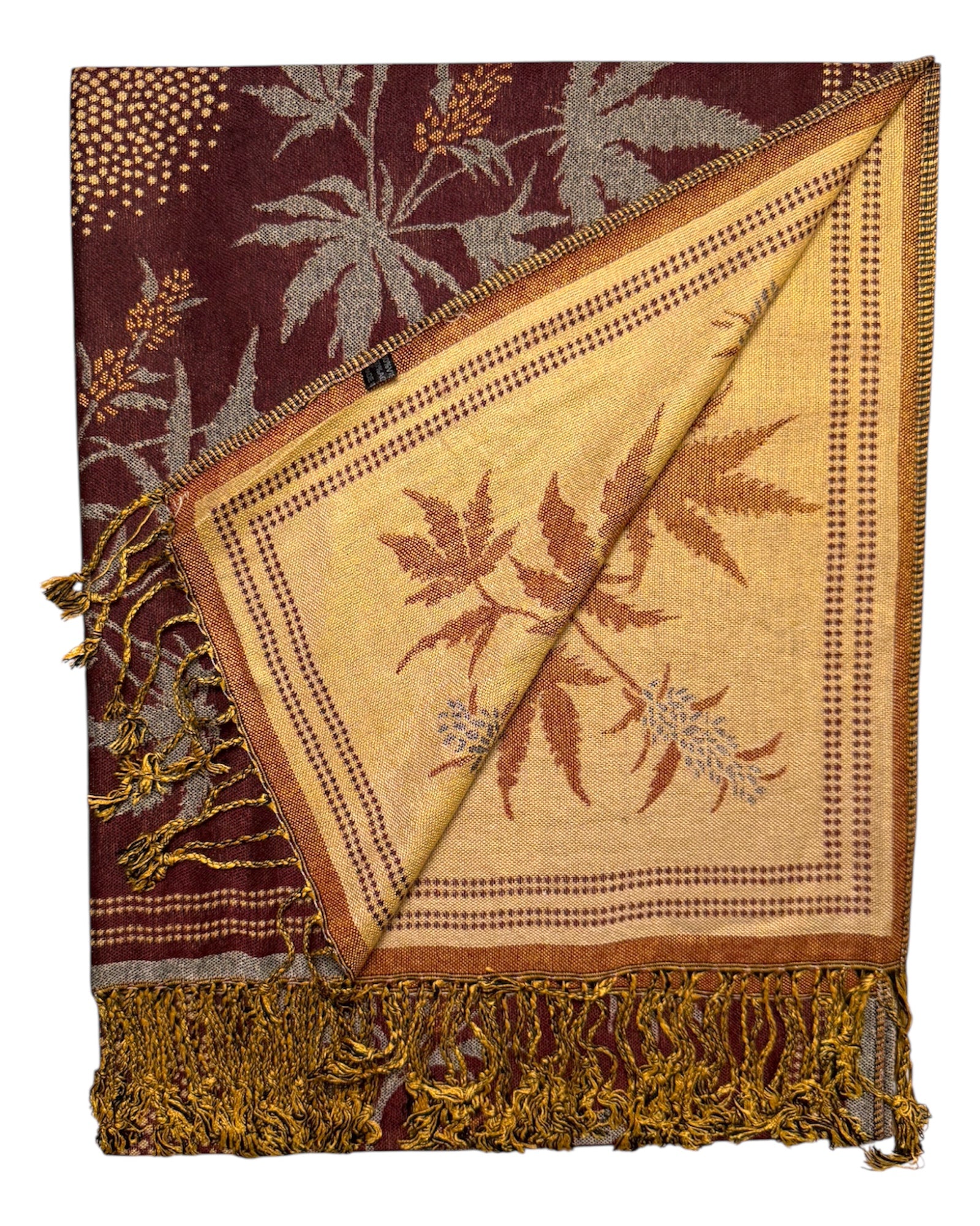 Maroon scarf with leaf pattern and gold fringe on a white background