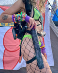 Magic Mushroom flash reflective fan holster worn at festival. Fan sold separately 