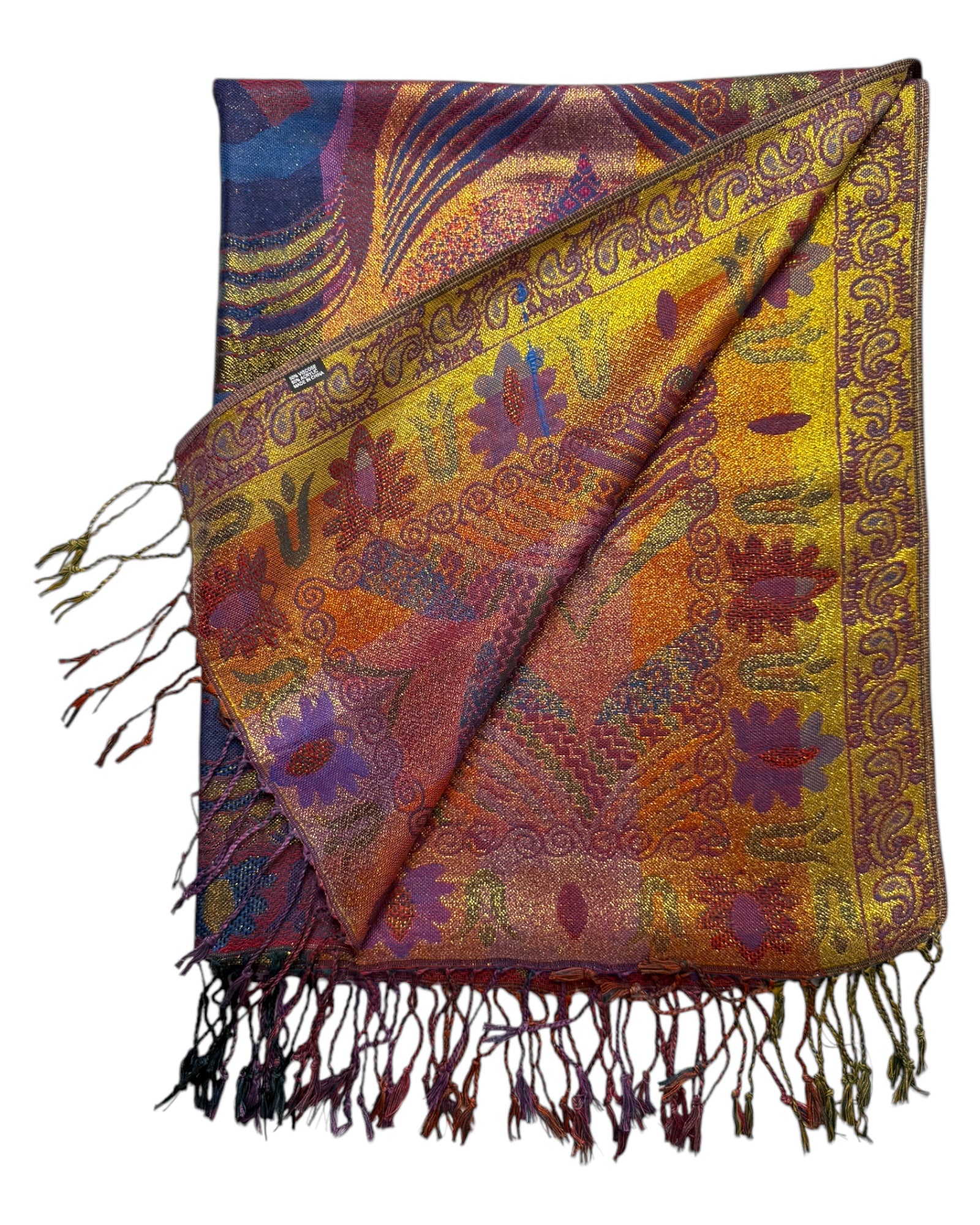 A reversible pashmina featuring one side with deep purples and the other with golden hues, both adorned with intricate floral and geometric patterns.
