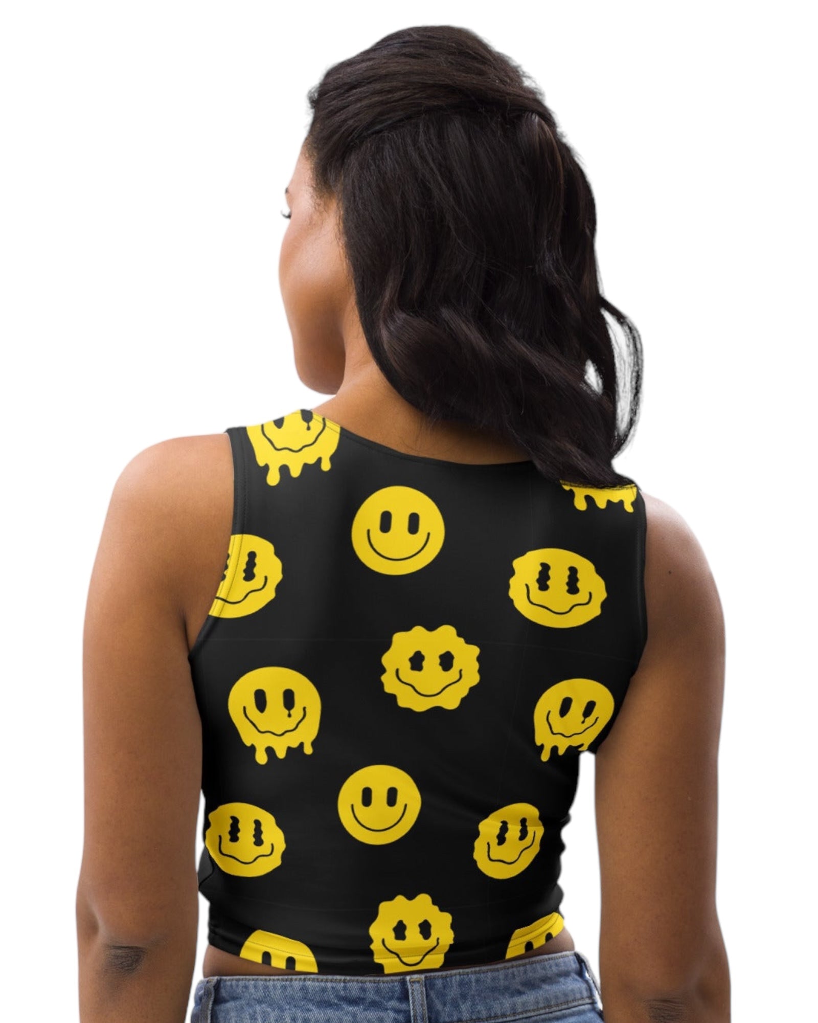Women showing the back view of Trippie Crop Top - Patterned with yellow smiley faces on black, showcasing the back design of this crop top for rave wear.