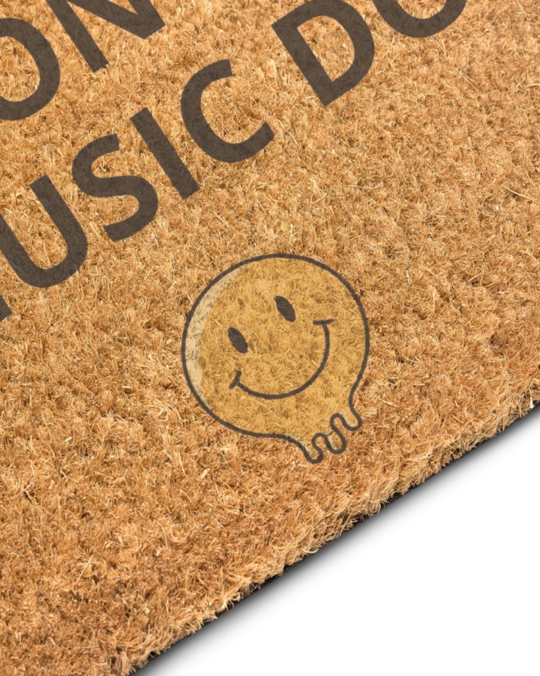 Detail of melty smiley face on music lover's doormat design