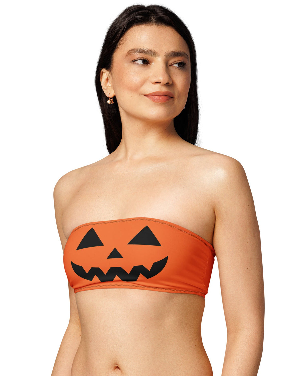 Model wearing the orange jack-o’-lantern bandeau as a Halloween rave top