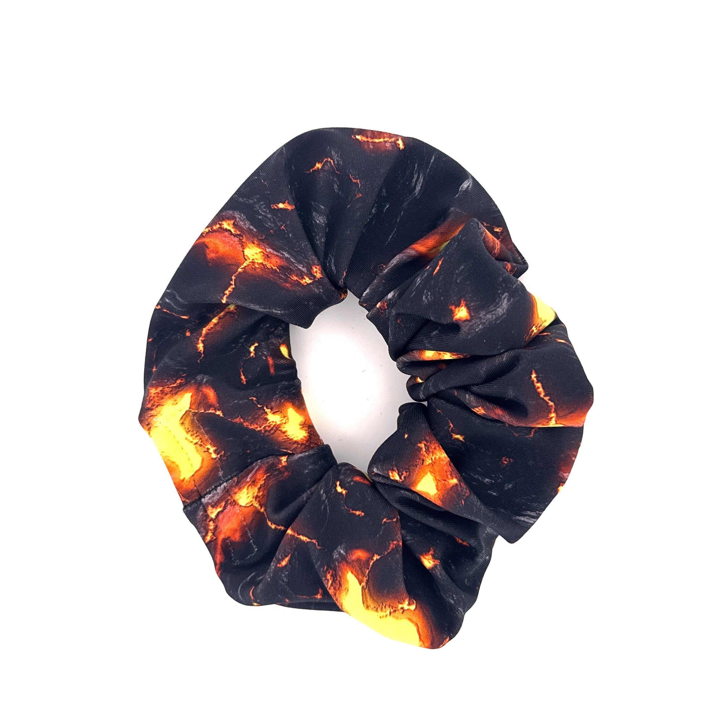 Molten Drip stashie with black and lava orange pattern, worn as a rave outfit hair or wrist accessory