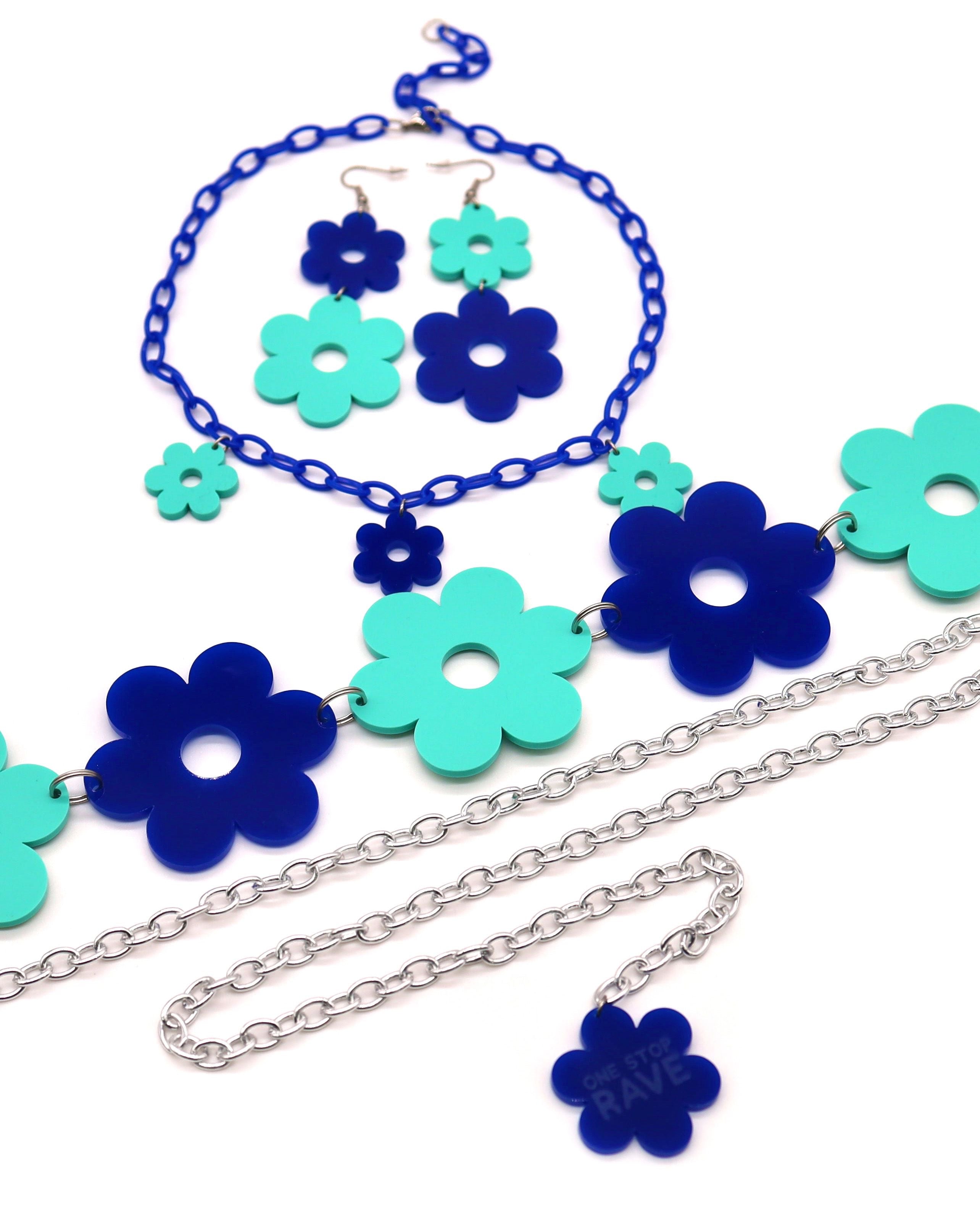 The matching Flower Power Blue set which includes the earrings, choker, and belt.