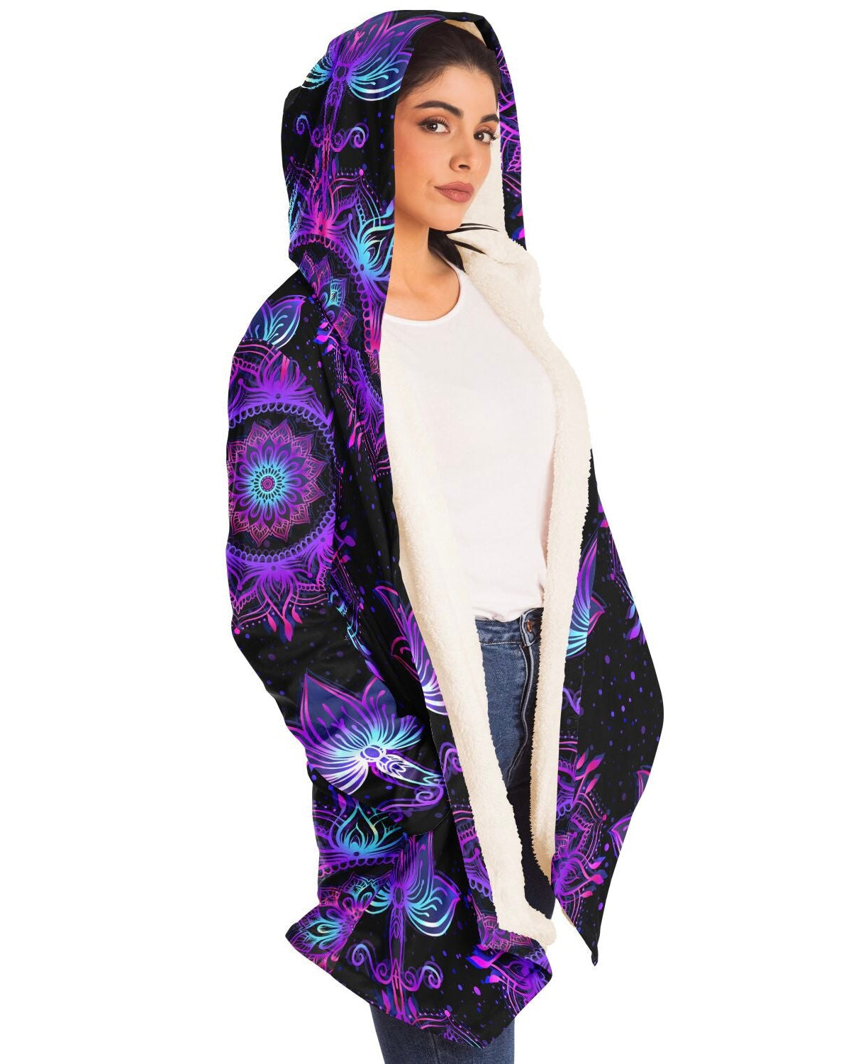 Side-front view of the female model showcasing the Starlight Mandala Cloak.